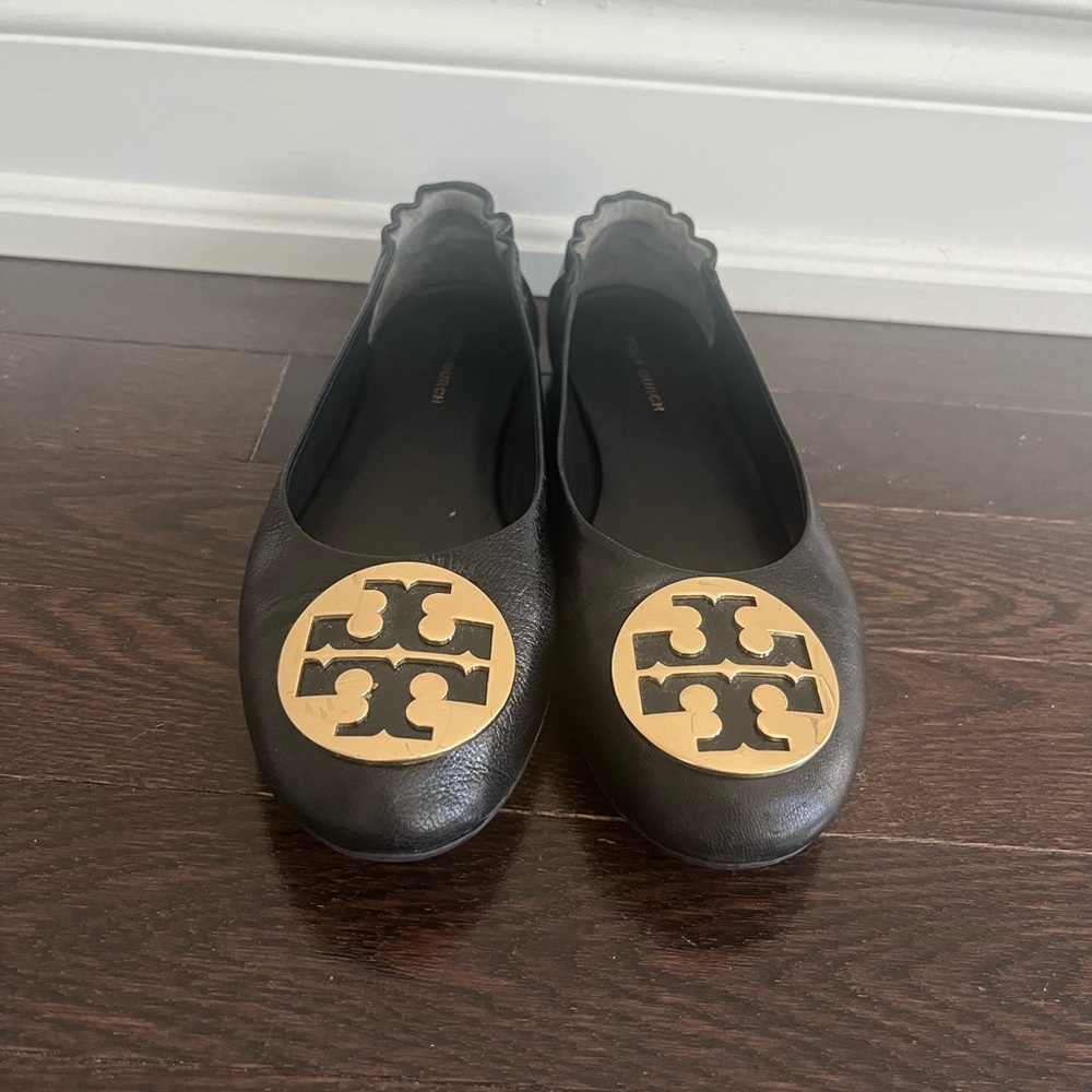 Tory Burch Black Flats with Gold Emblem